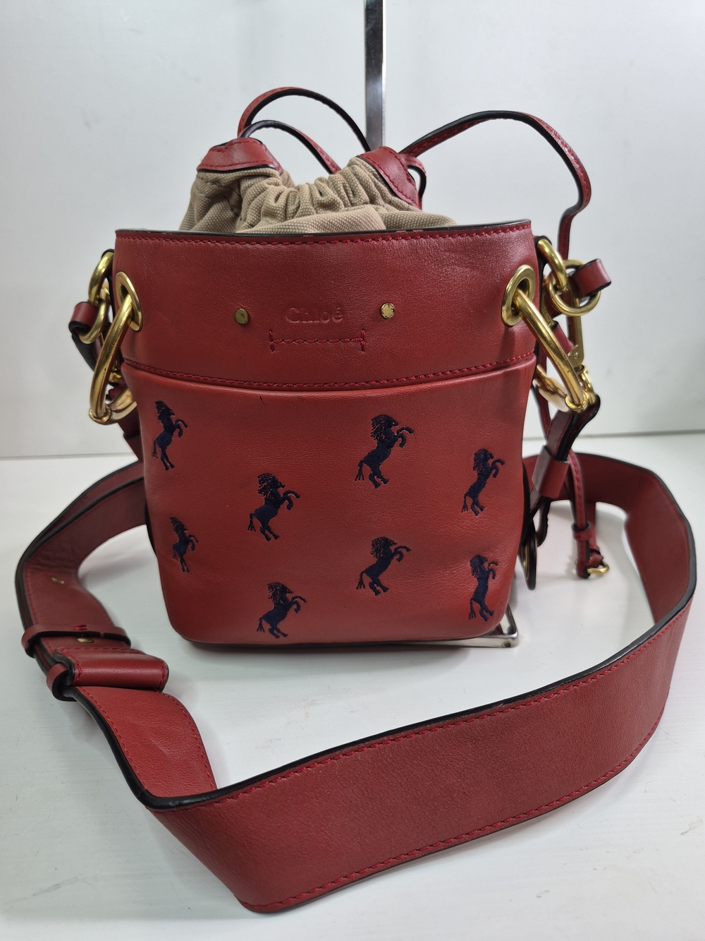 Chloe Red Leather Crossbody Bucket Bag with Navy Embroidered Horses